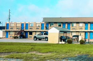 Roof missing from Budget Motel