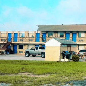 Roof missing from Budget Motel