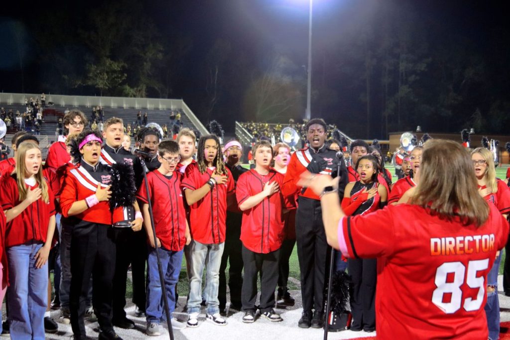 ACHS Chorus singing the National Anthem