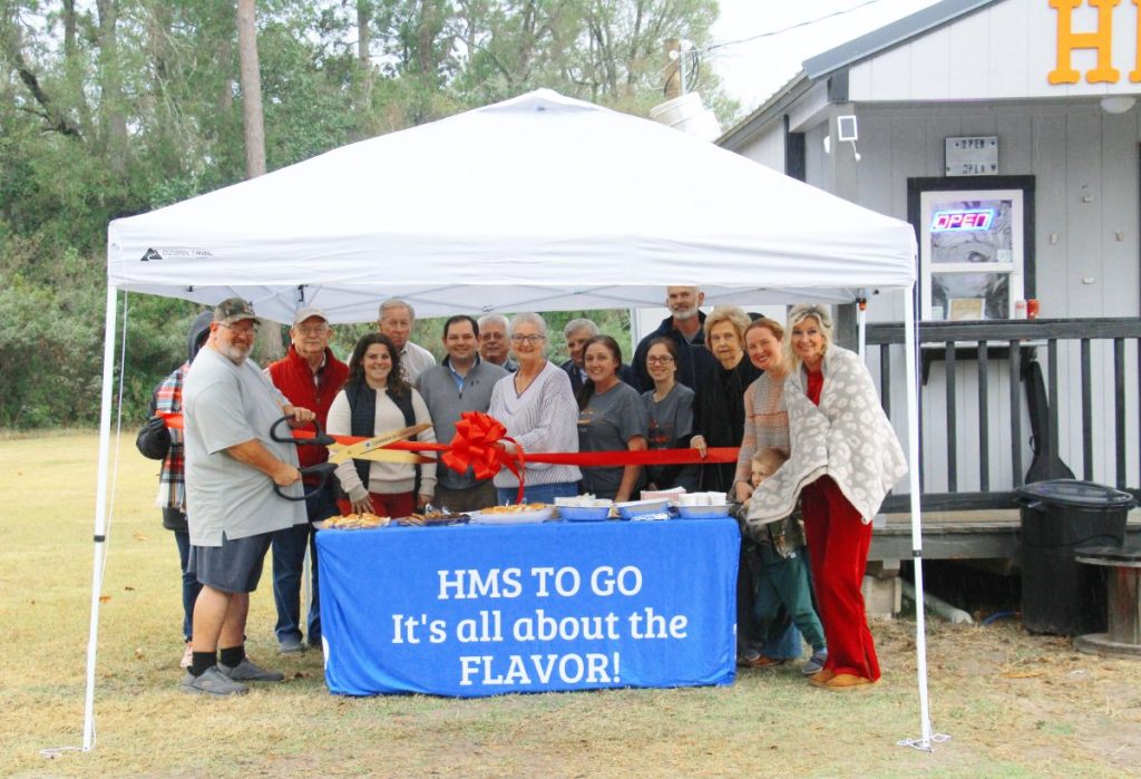 Under tent for HMS To-Go Ribbon Cutting